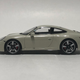 Illustration for article titled Minichamps 1/43 Porsche 911 50th Anniversary (991.1)